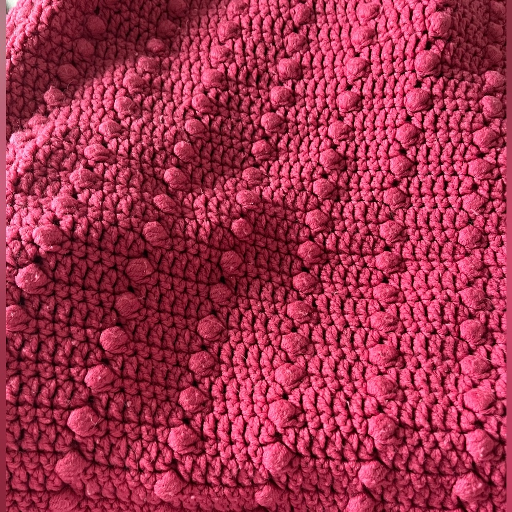 Pink crotched throw blanket